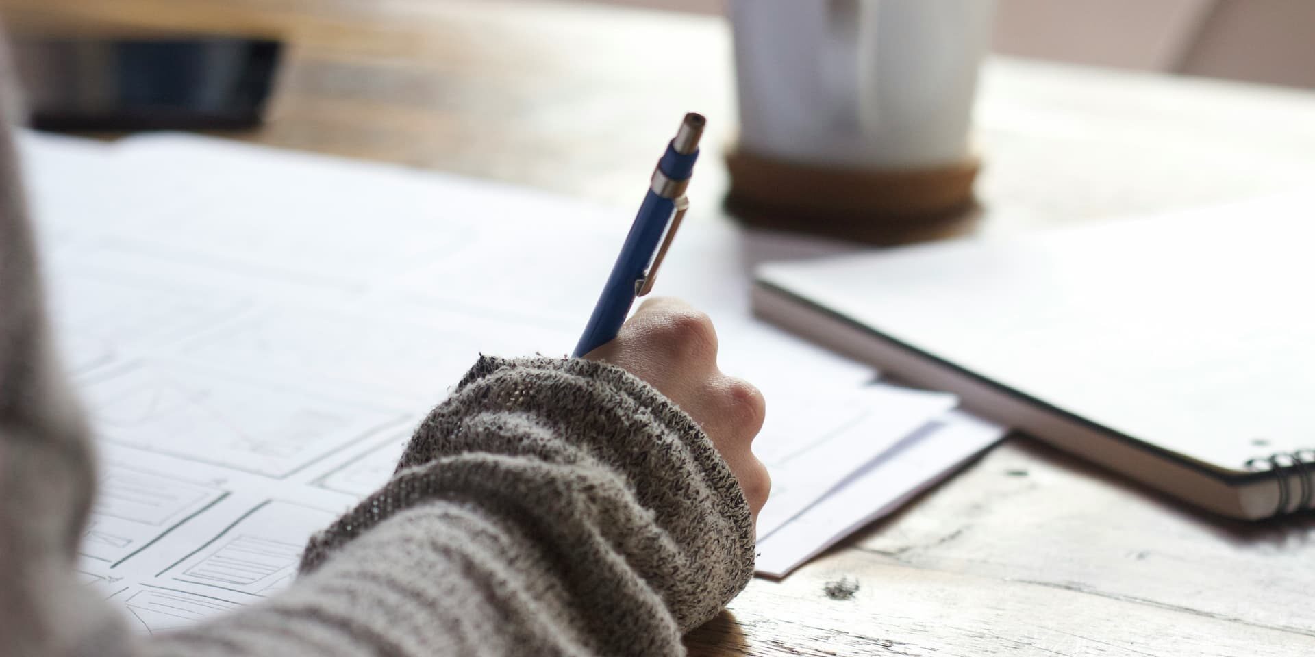 hand writing notes for a new blog